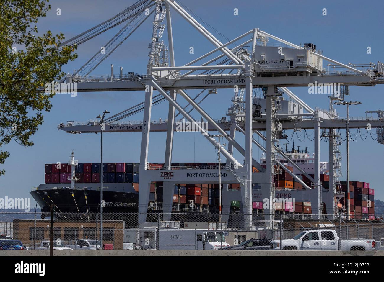 Shipping containers are unloaded from ships at a container terminal at the port of Oakland as truck drivers continue protesting against California's new law known as AB5, in Oakland, California, U.S., July 21, 2022. REUTERS/Carlos Barria Stock Photo