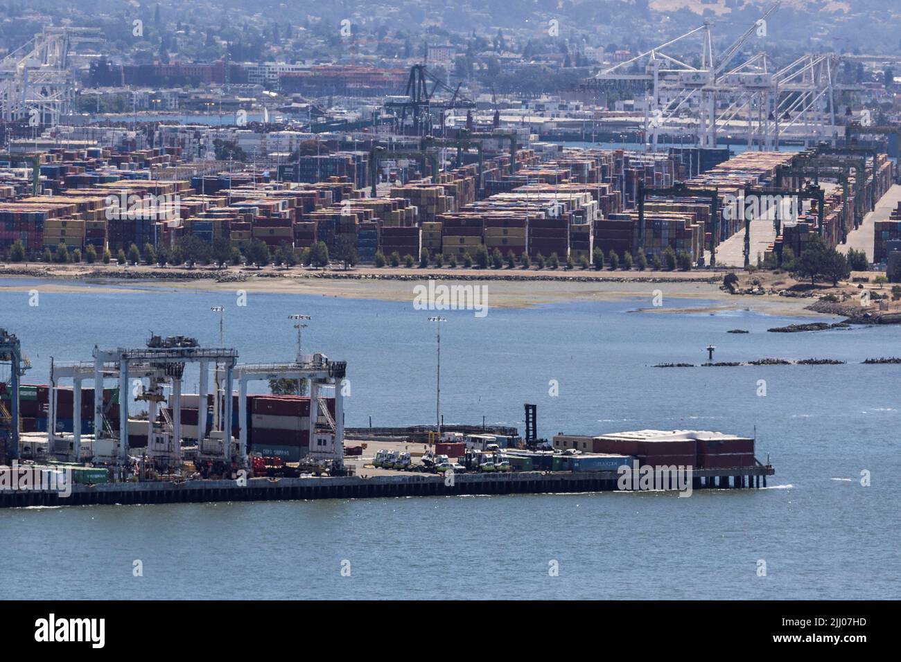 Shipping containers are seen at a terminal inside the Port of Oakland as truck drivers continue protesting against California's new law known as AB5, in Oakland, California, U.S., July 21, 2022. REUTERS/Carlos Barria Stock Photo