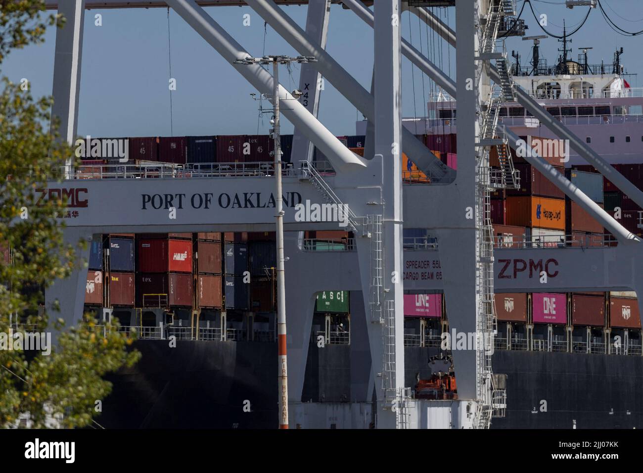 Shipping containers are unloaded from ships at a container terminal at the port of Oakland as truck drivers continue protesting against California's new law known as AB5, in Oakland, California, U.S., July 21, 2022. REUTERS/Carlos Barria Stock Photo
