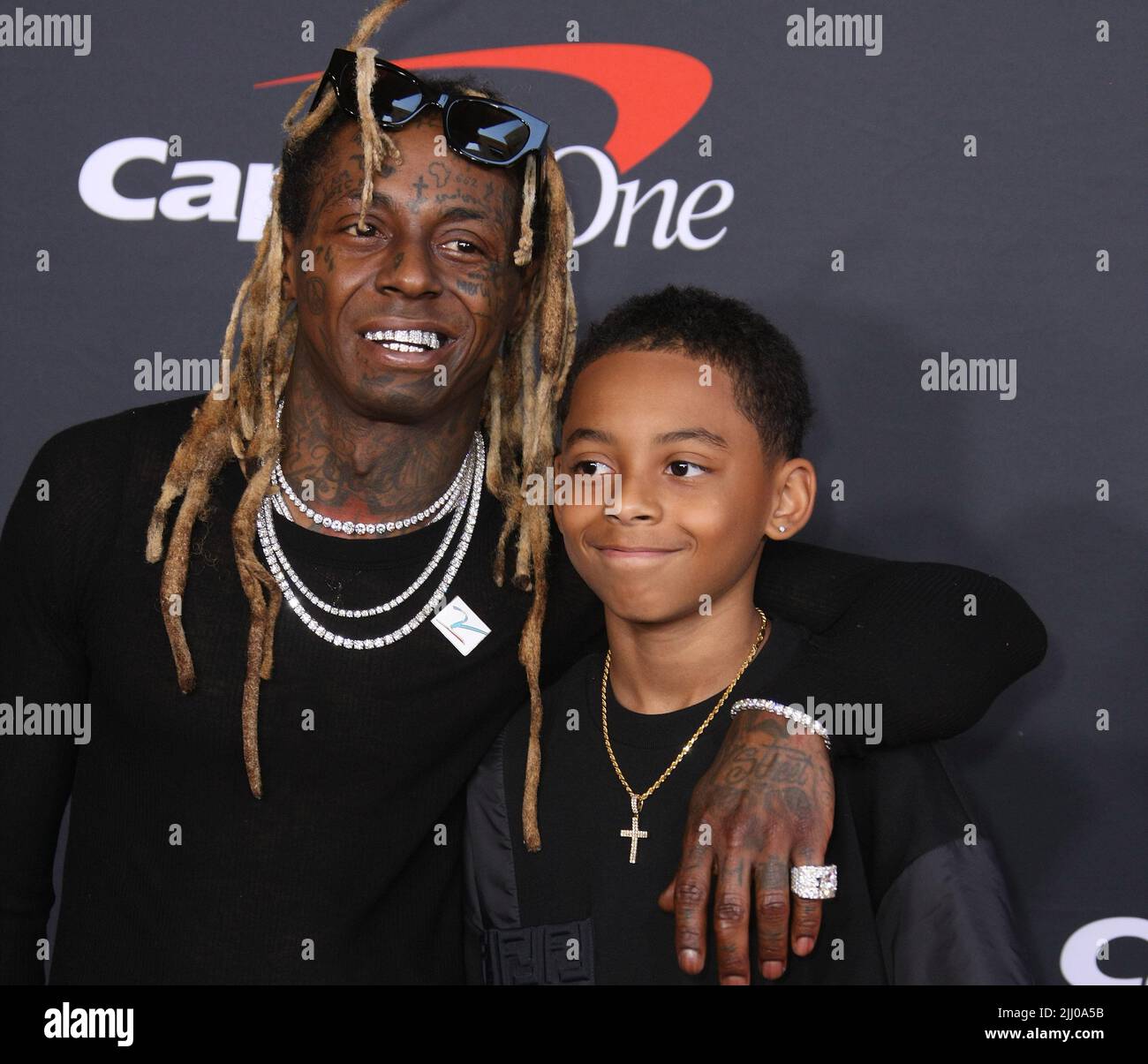 Lil Wayne and Kameron Carter attend the 2022 ESPYs at Dolby Theatre on
