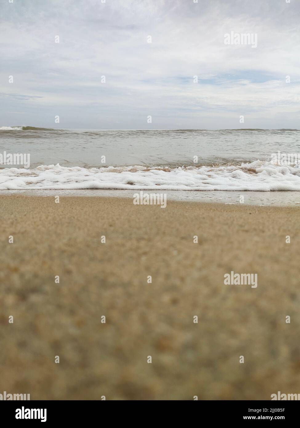 Vertical shot sea waves white hi-res stock photography and images - Alamy