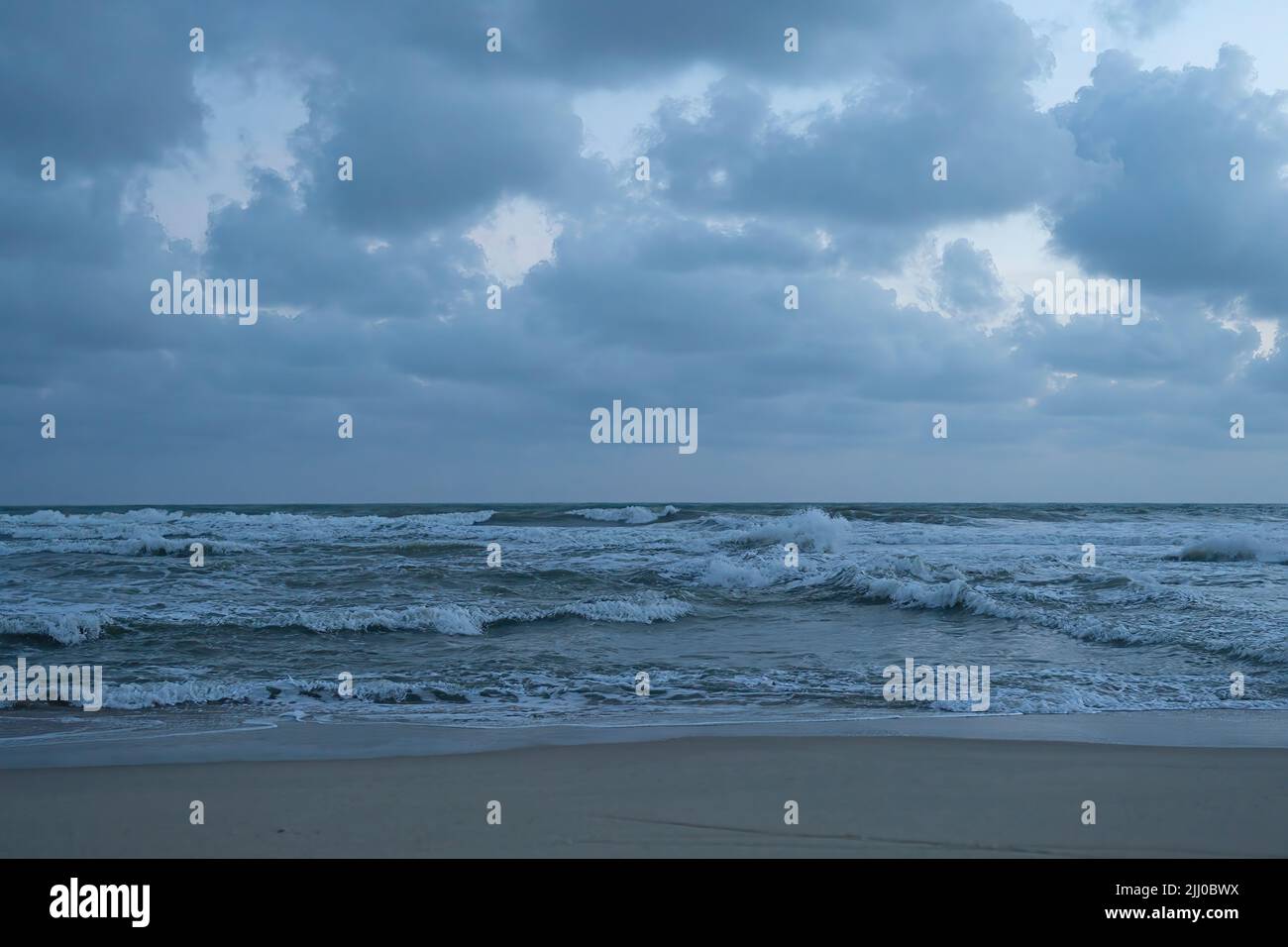 Calm empty beach during hi-res stock photography and images - Alamy