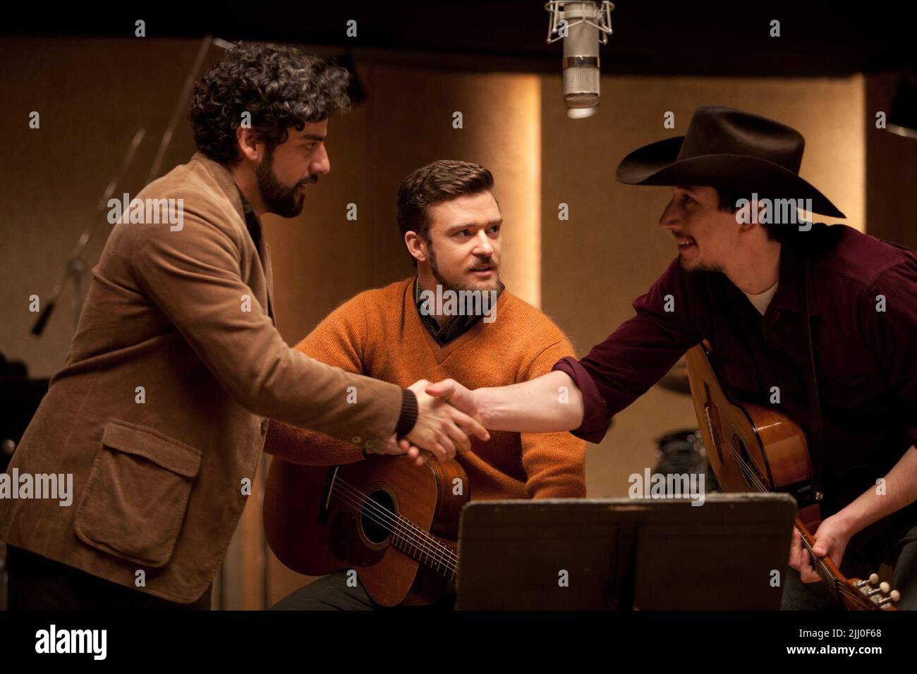 ISAAC,TIMBERLAKE,HEDLUND, INSIDE LLEWYN DAVIS, 2013 Stock Photo