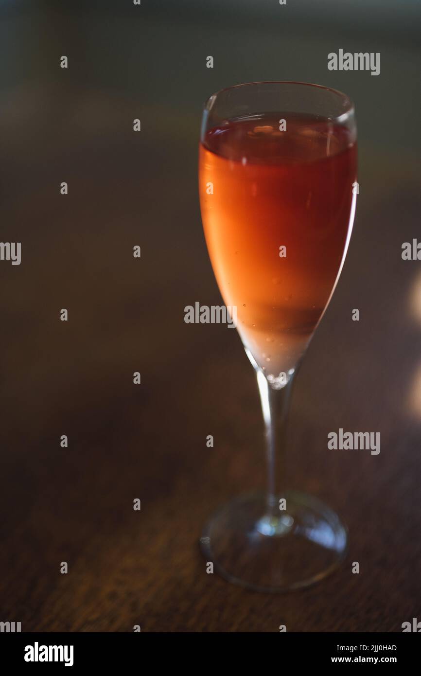 orange wine cocktail drink in champagne flute Stock Photo Alamy