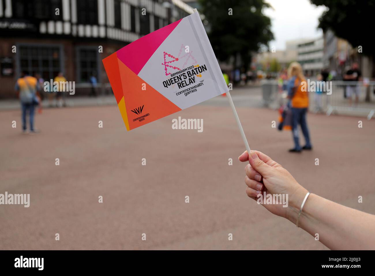 A Commonwealth Games Baton Relay Flag as the Queen’s Baton passes