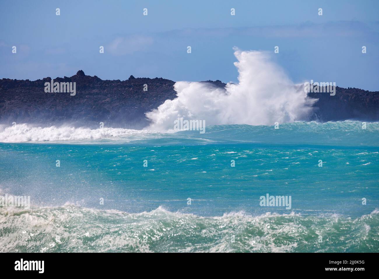 Crashing surf at La Perouse Bay on South Maui. Record breaking waves up to 24 feet hit the south shore of the Hawaiian islands on July. 17, 2022 from Stock Photo