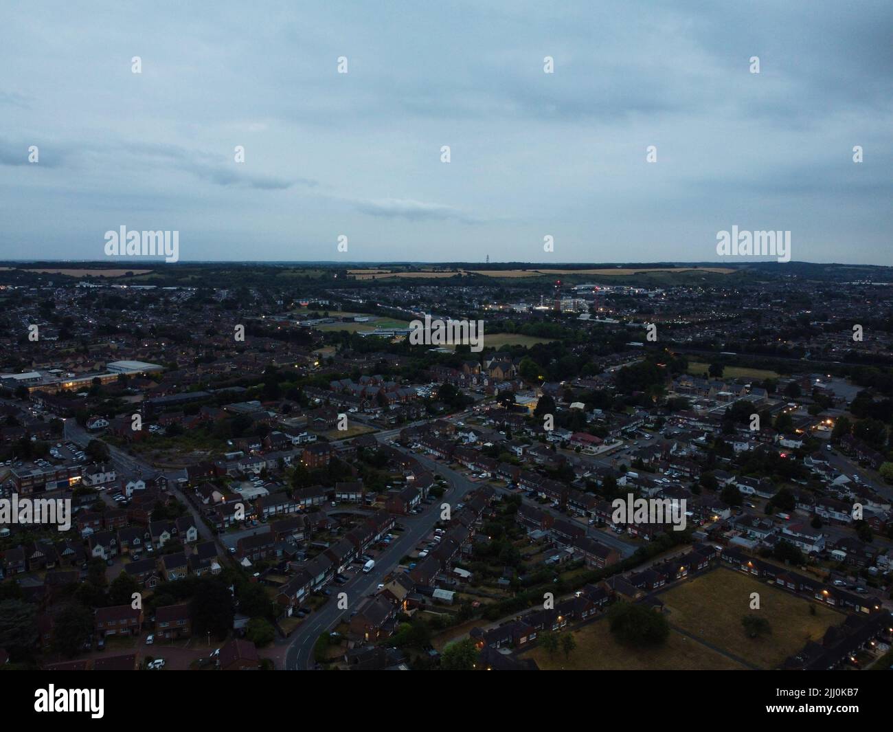 Beautiful Night Aerial View of Illuminated Roads and Houses over Luton