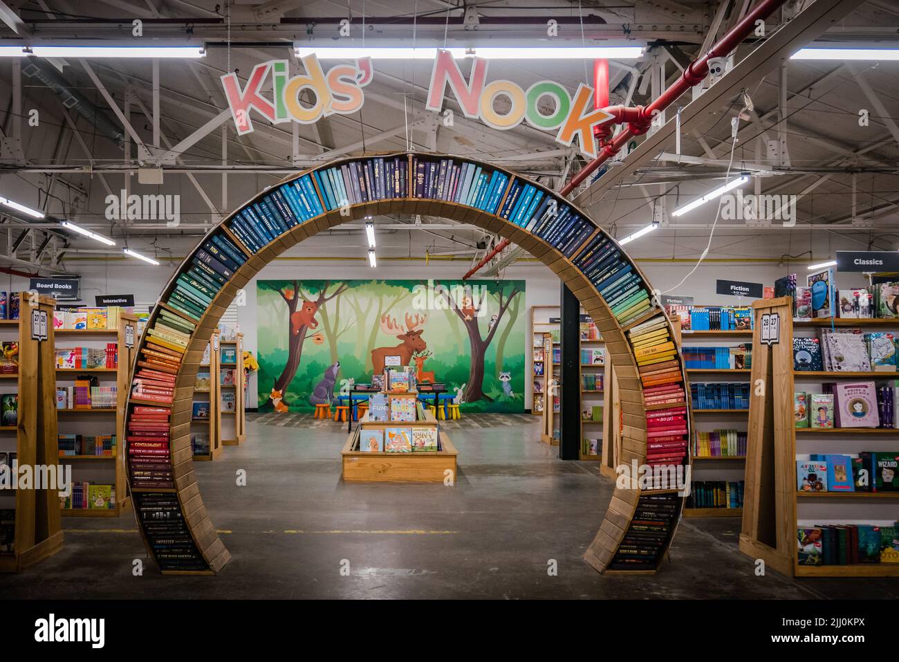 an arch of books inside a bookstore Stock Photo