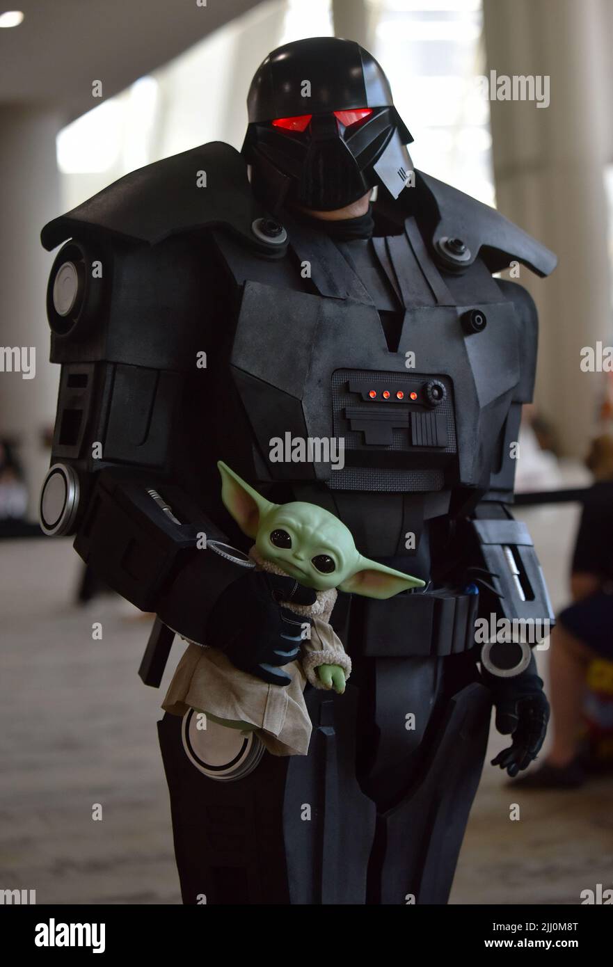 San Diego, United States. 21st July, 2022. A fan cosplaying the Mandalorian with Baby Yoda attends Comic-Con at the San Diego Convention Center in San Diego, California on Thursday, July 21, 2022. The fan favorite convention runs July 21 through July 24. Photo by Chris Chew/UPI Credit: UPI/Alamy Live News Stock Photo