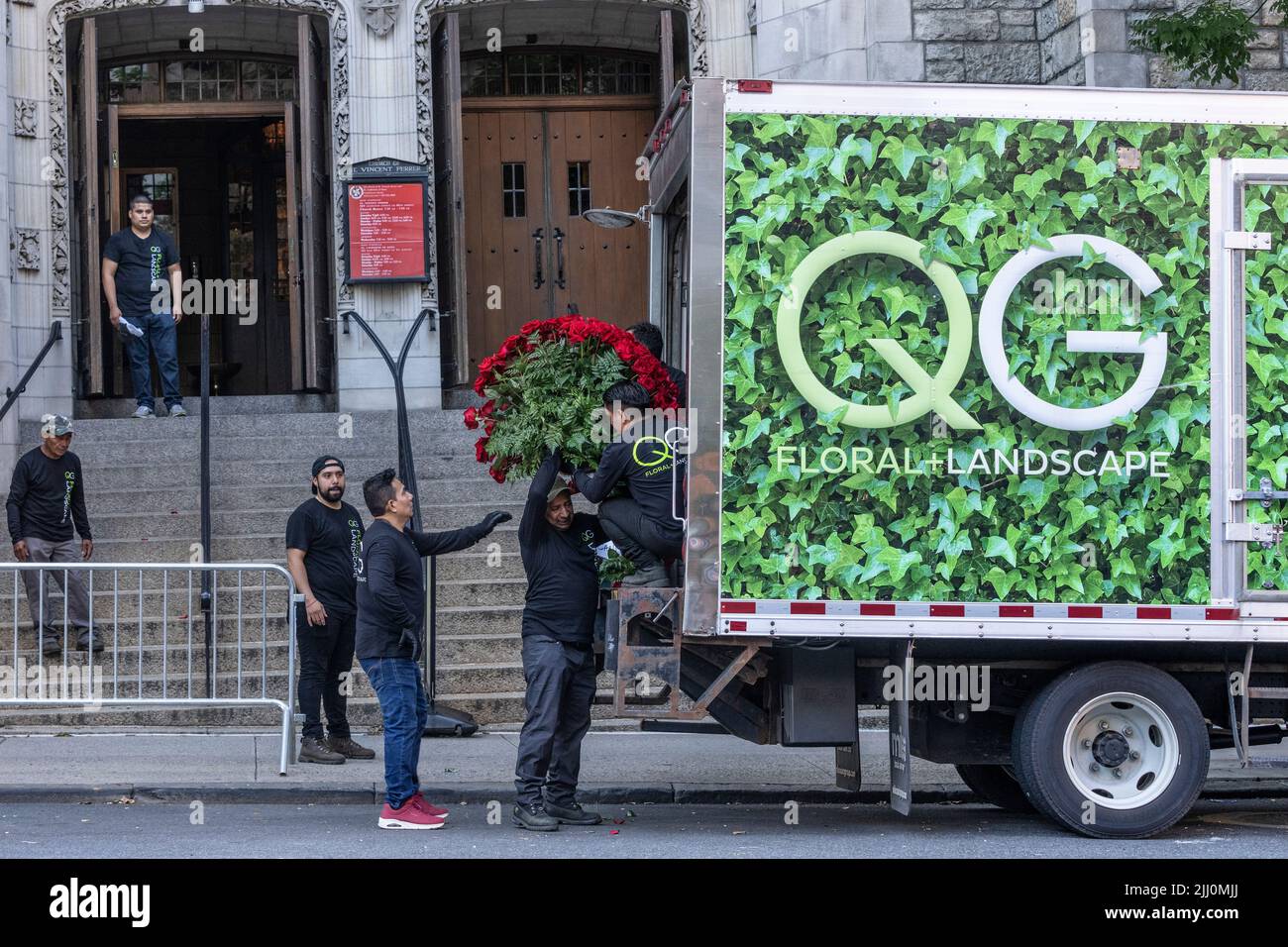 New York, NY July 20, 2022 Workers deliver flowers for funeral of