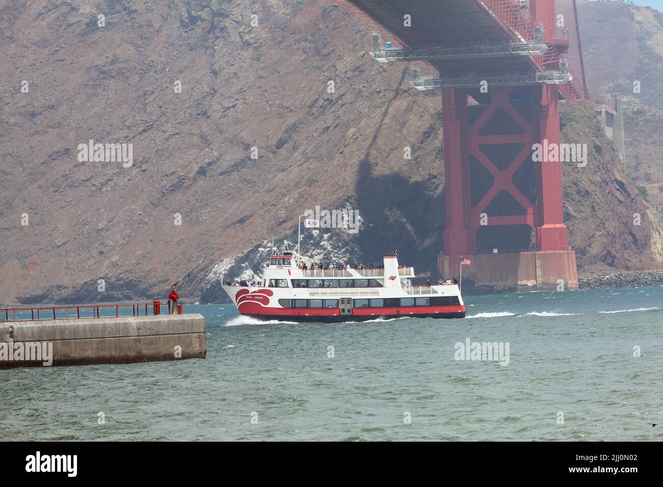 Red & White fleet Royal Prince sightseeing and charter cruising  under the Golden Gate bridge, San Francisco, California, USA Stock Photo