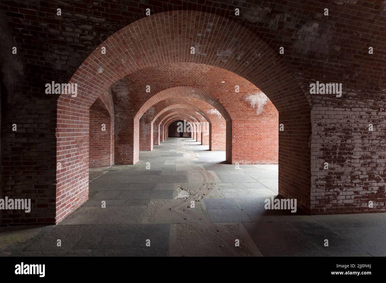 Brick corridor and arches at Fort Point natural historic site, San Francisco, California, USA Stock Photo