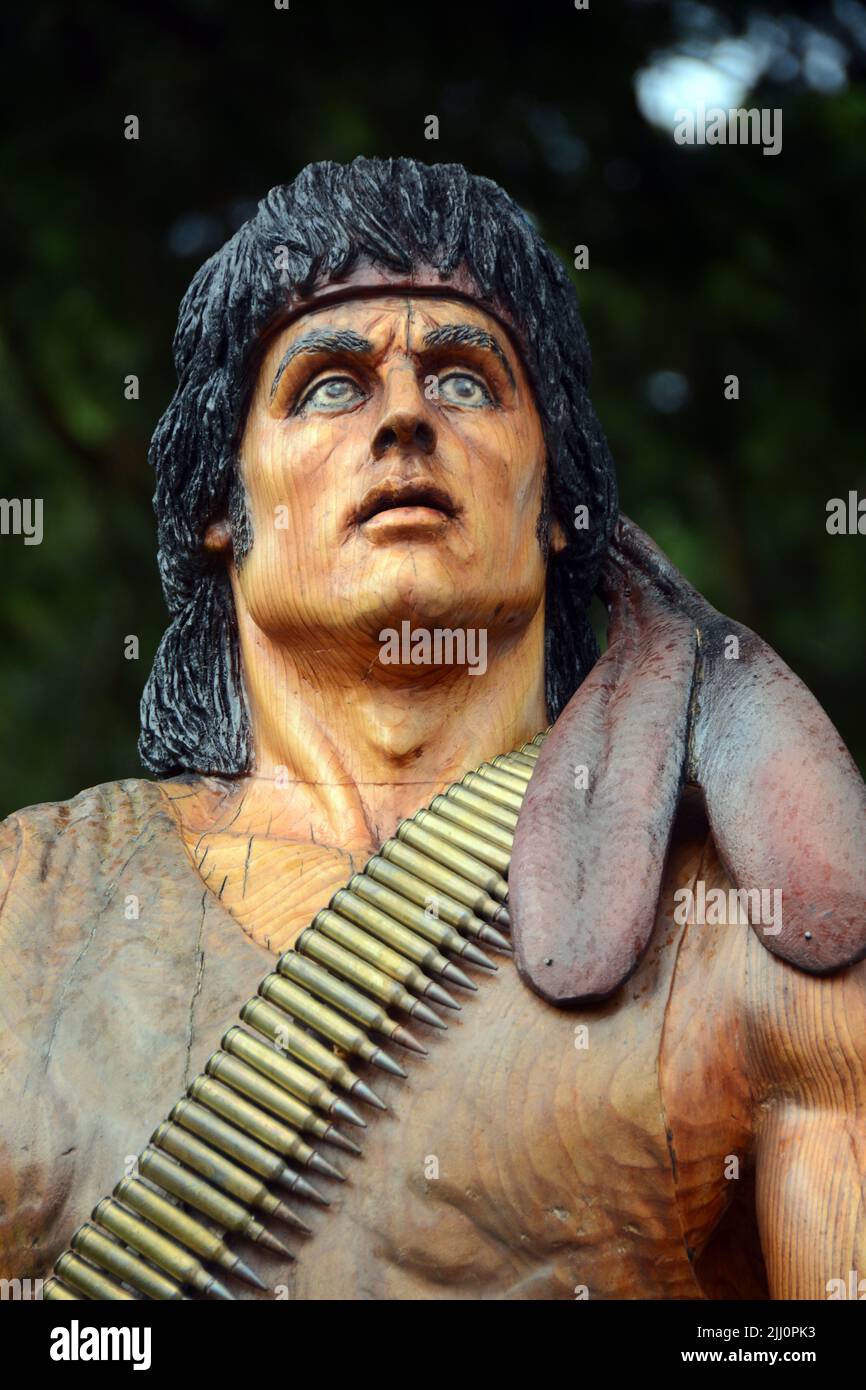 A wooden statue showing the character John Rambo, played by Sylvester Stallone, from the First Blood/Rambo films, in Hope, British Columbia, Canada. Stock Photo