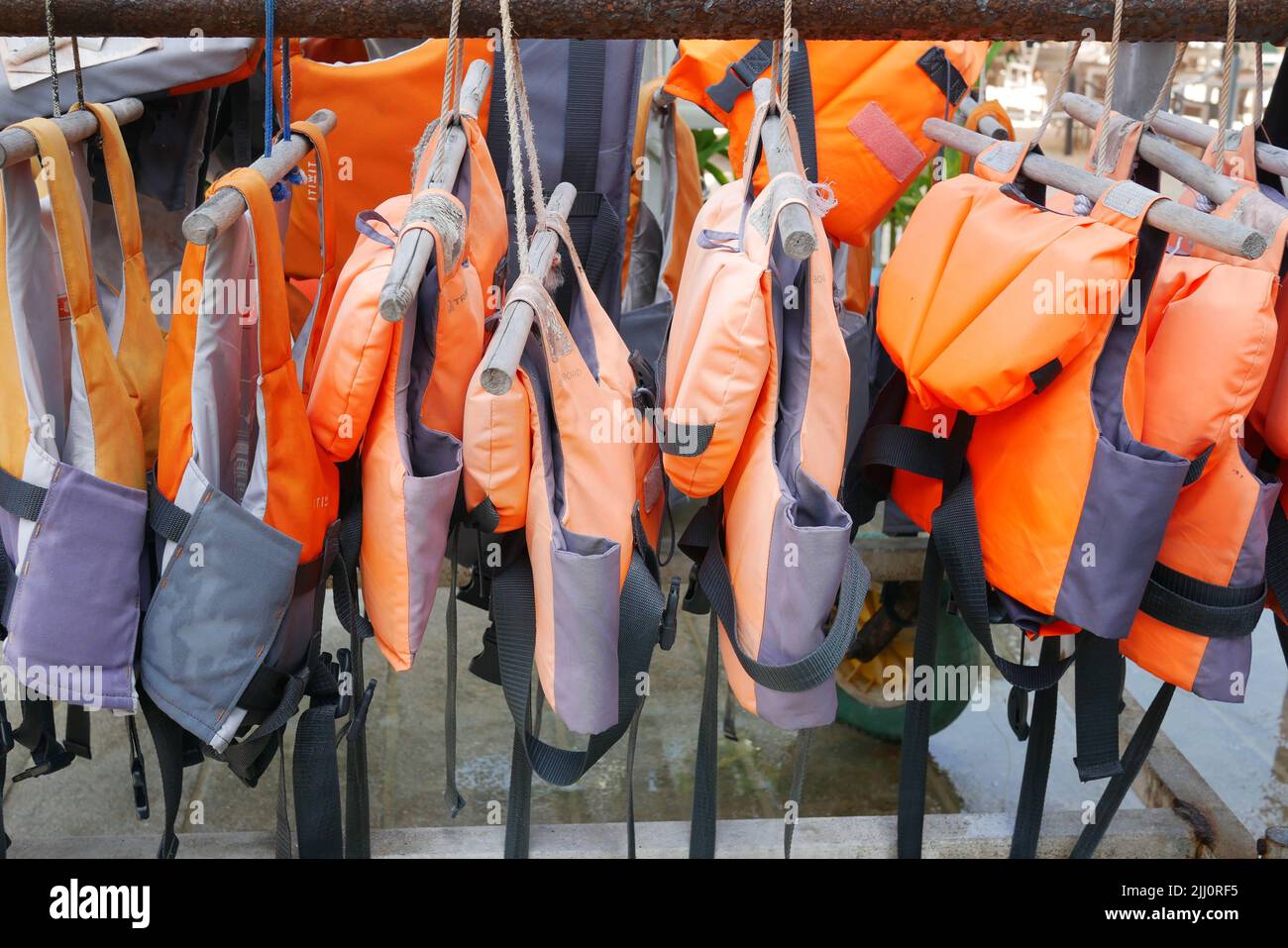 stack of life jacket in a boat Stock Photo - Alamy