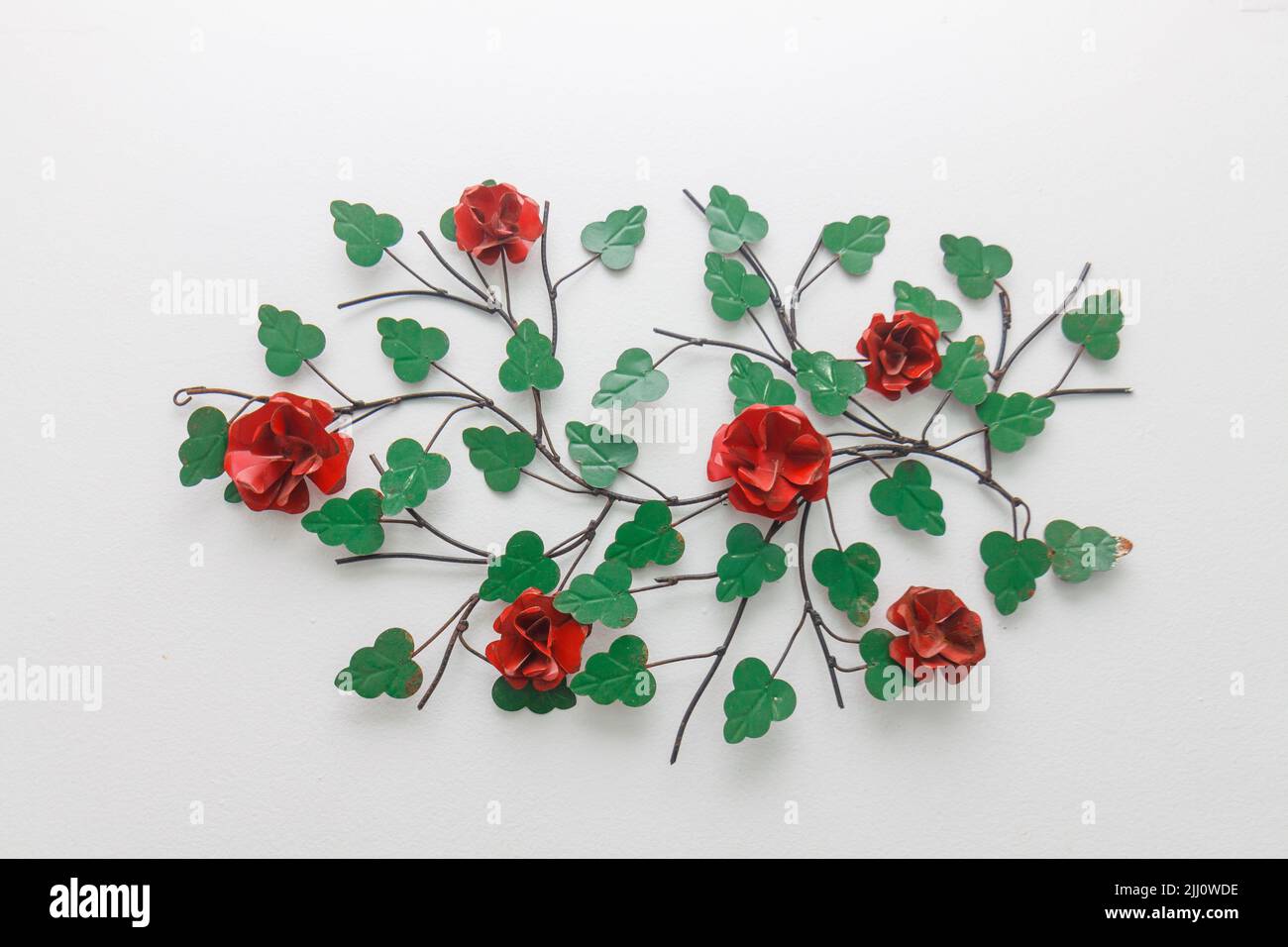 red rose decorating a white wall in Rio de Janeiro Stock Photo - Alamy
