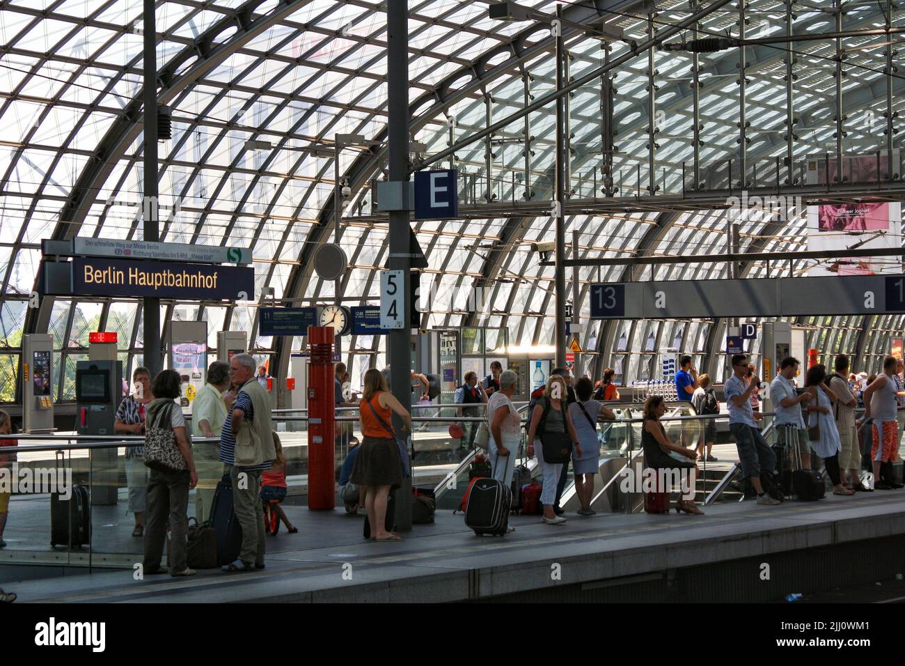 View of Berlin Hauptbahnhof interior in summer with crowd of people ...