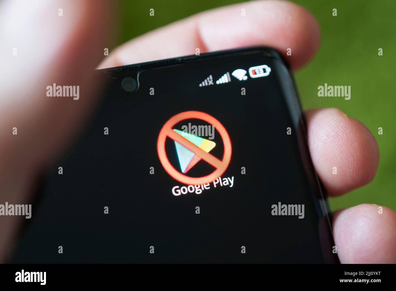 icon of the blocked google play on a black smartphone screen. Barnaul