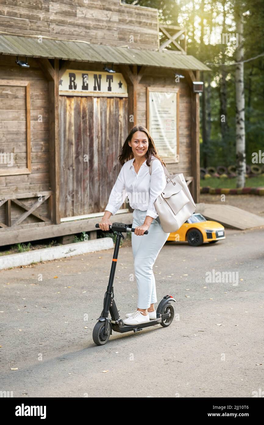 Lady on electric scooter hires stock photography and images Alamy