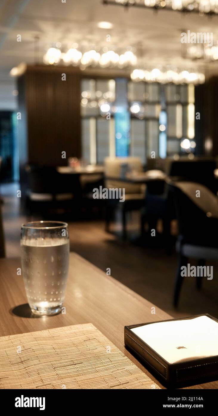 Glass of Water with a Blurred Background at a Five Star Cafe Bangkok Thailand Stock Photo