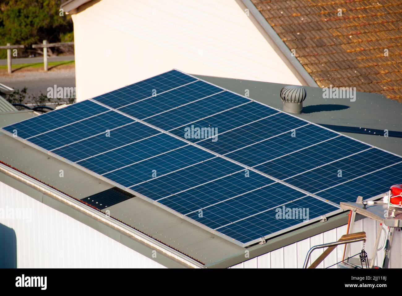 Residential Solar Panels on House Roof Stock Photo