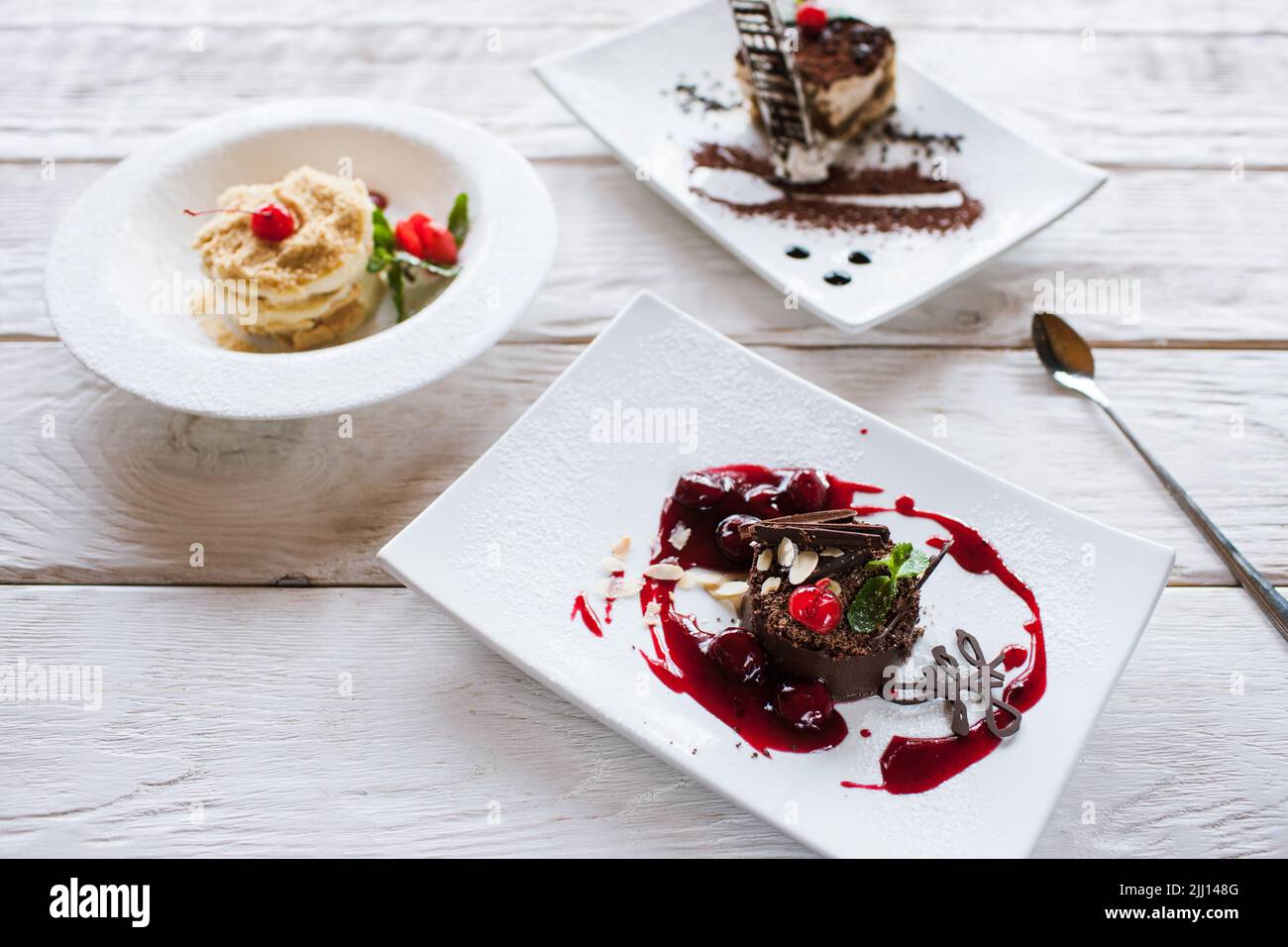 Presentation of delicious desserts in restaurant Stock Photo Alamy