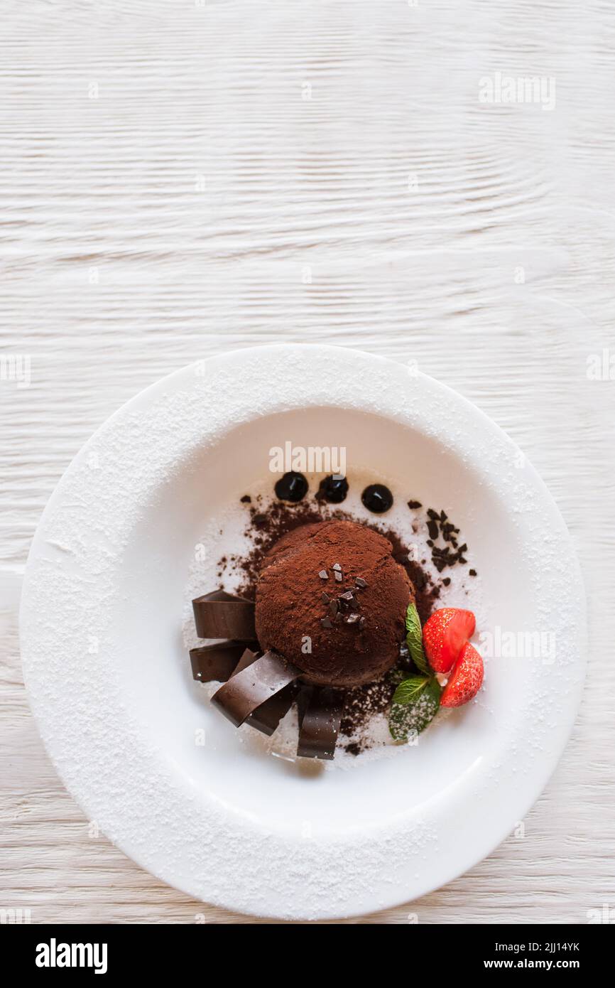 Chocolate fondant on wooden background Stock Photo