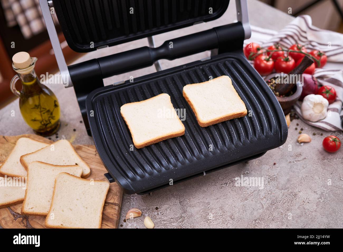 Morning homemade snack Toast bread pan fried on black electric