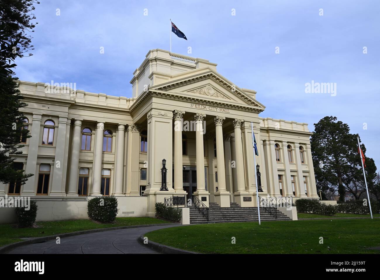 Main facade and classical portico of the grand St Kilda Town Hall, also known as St Kilda City Hall, during a cloudy afternoon Stock Photo
