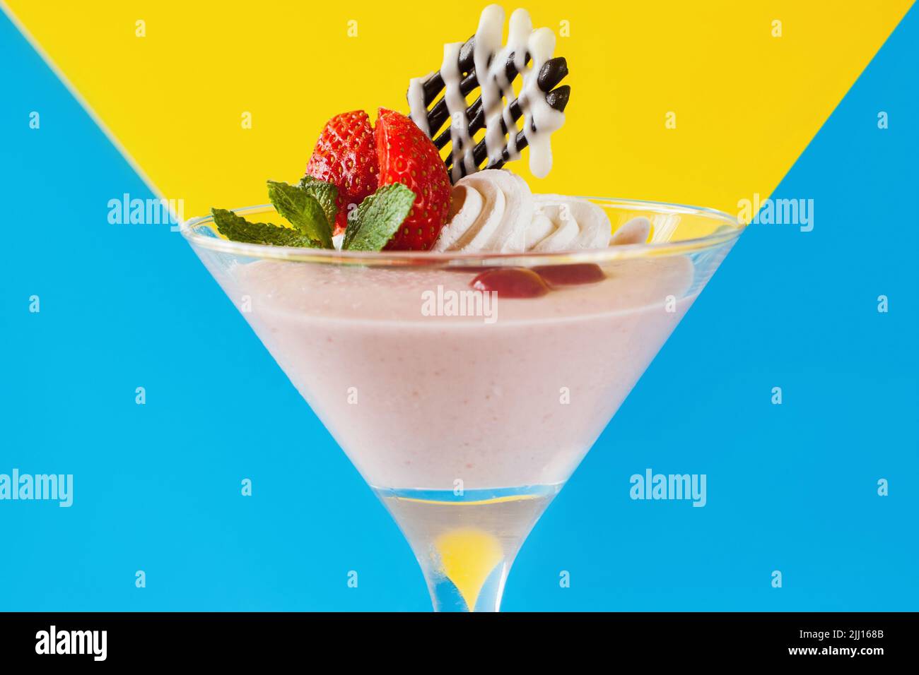 Creamy strawberry dessert on contrast background Stock Photo Alamy