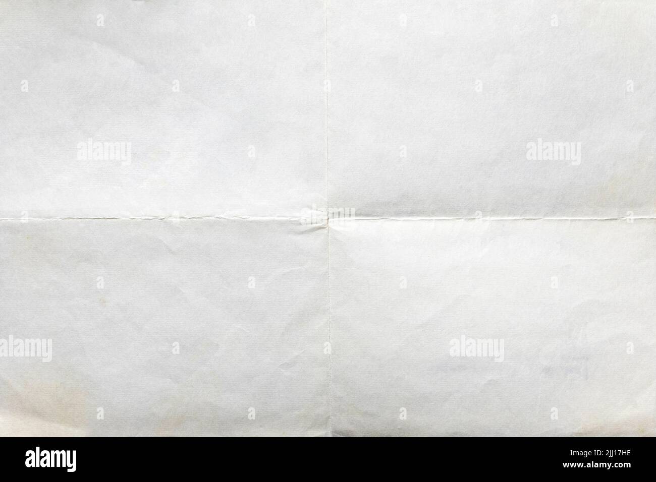 Old letter paper folded in four, texture background Stock Photo