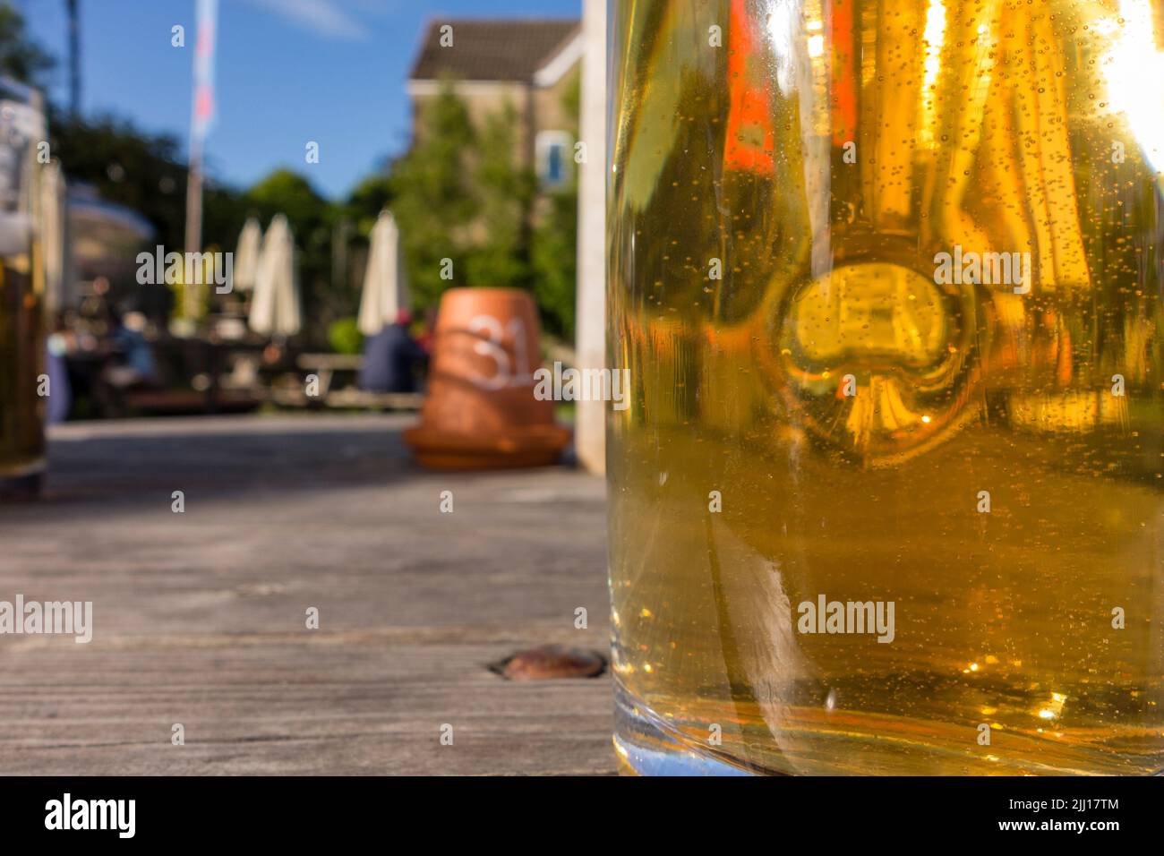 Pint of beer and pub garden, Tetbury, Gloucestershire, UK Stock Photo