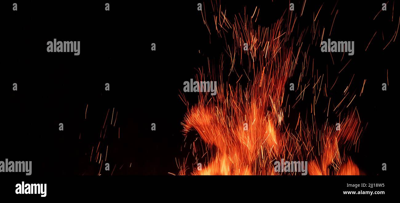 Fire flame isolated on black background Stock Photo - Alamy