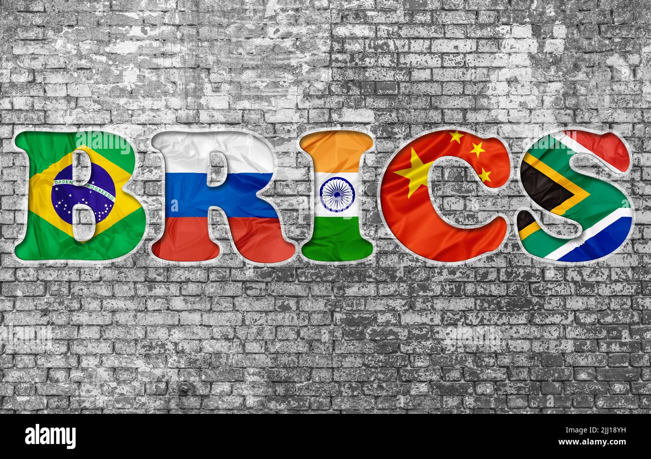 Acronym BRICS association of Brazil, Russia, India, China and South Africa. Flags isolated on wall background. Major Emerging markets or new economies Stock Photo