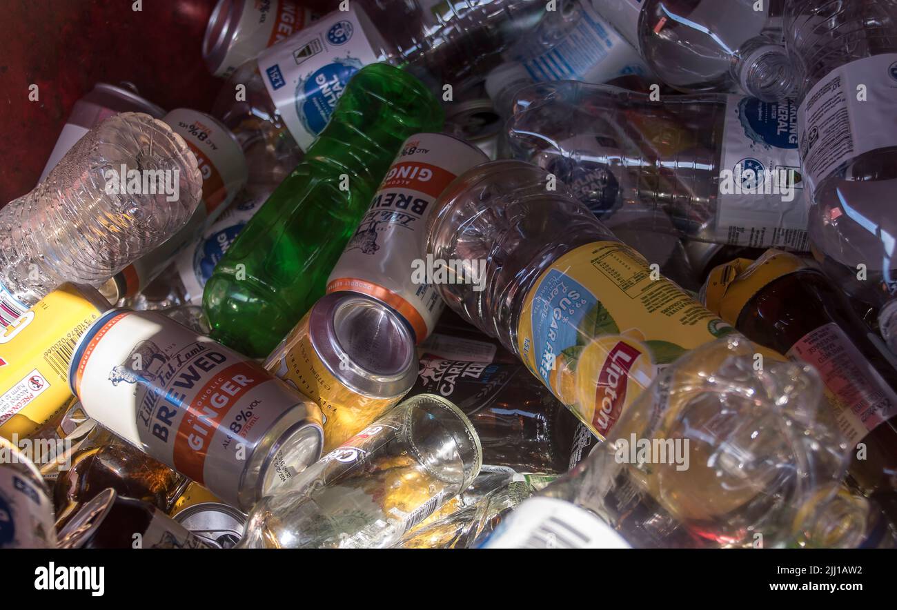 Empty drinks bottles and cans collected in a skip for re-cycling in Australia. Containers worth 10 cents each for charity. Scouts Australia scheme. Stock Photo