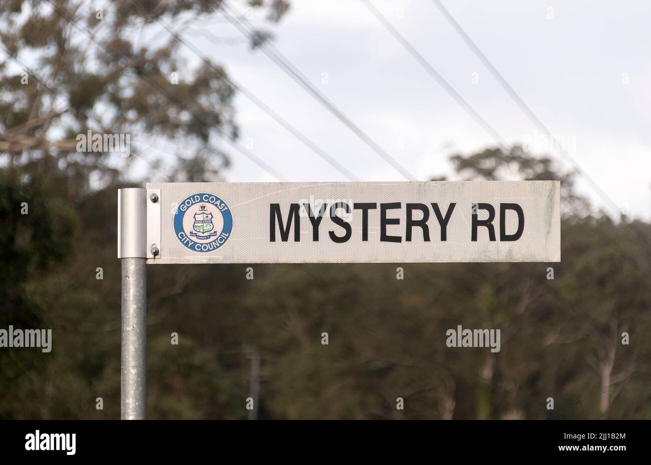 'Mystery Road' road sign in the Gold Coast, Queensland, Australia. Signpost in rural setting. Pre-dates Australian TV drama series Mystery Road. Stock Photo