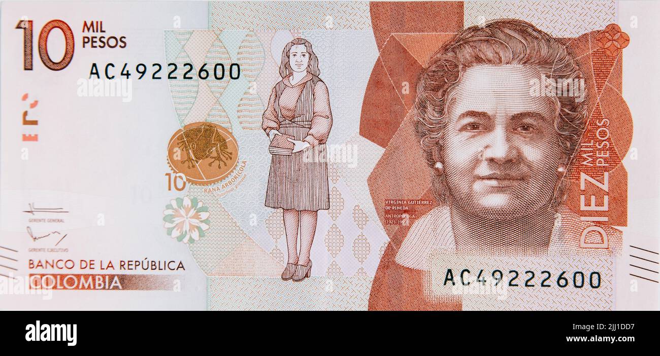 A Colombian Money Ten Thousand Pesos On White Background Business a-colombian-money-ten-thousand-pesos-on-white-background-business
