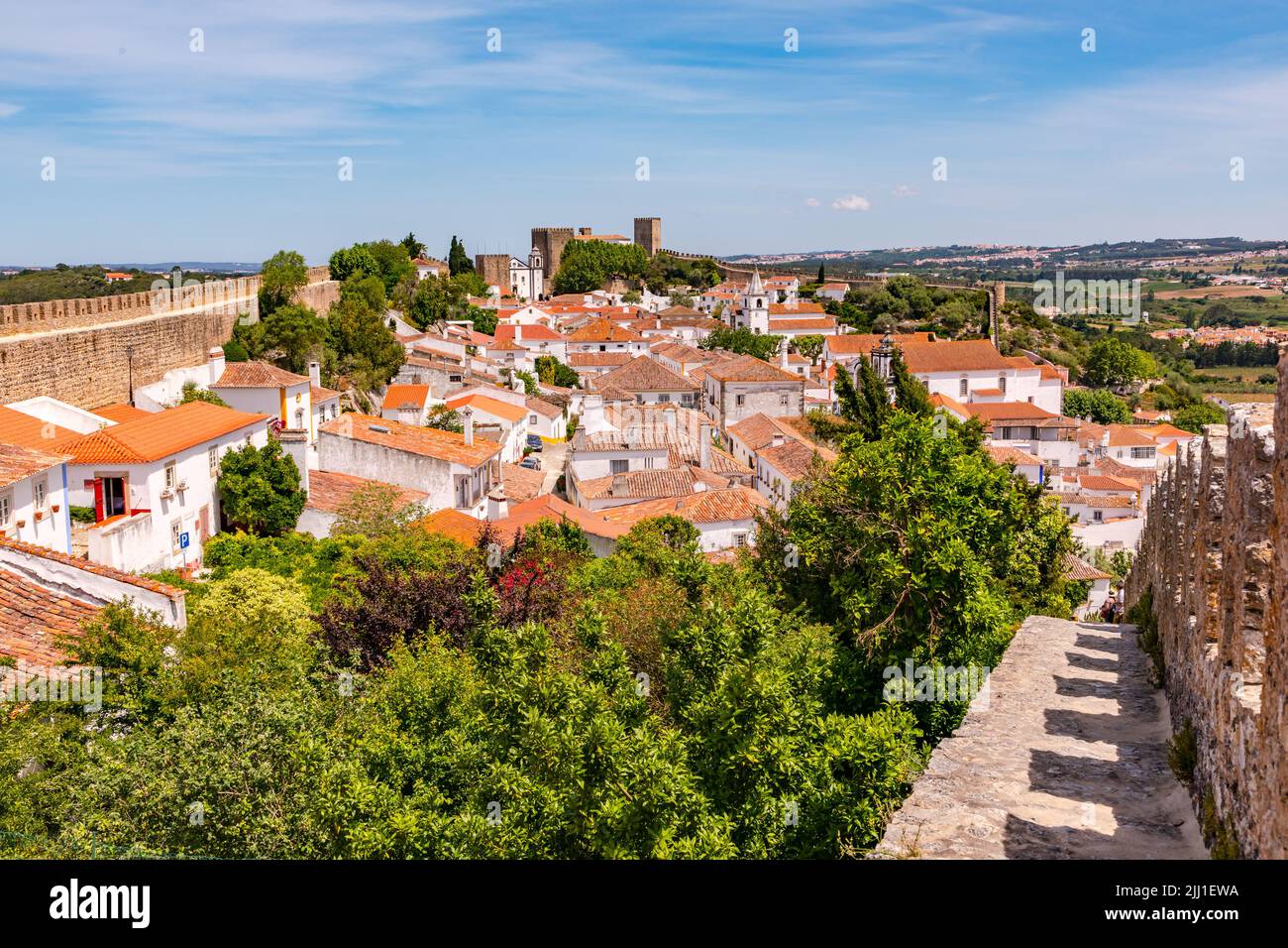 The castle fortress of Obidos with a completely preserved and accessible city wall and the Castelo de Obidos, Portugal Stock Photo