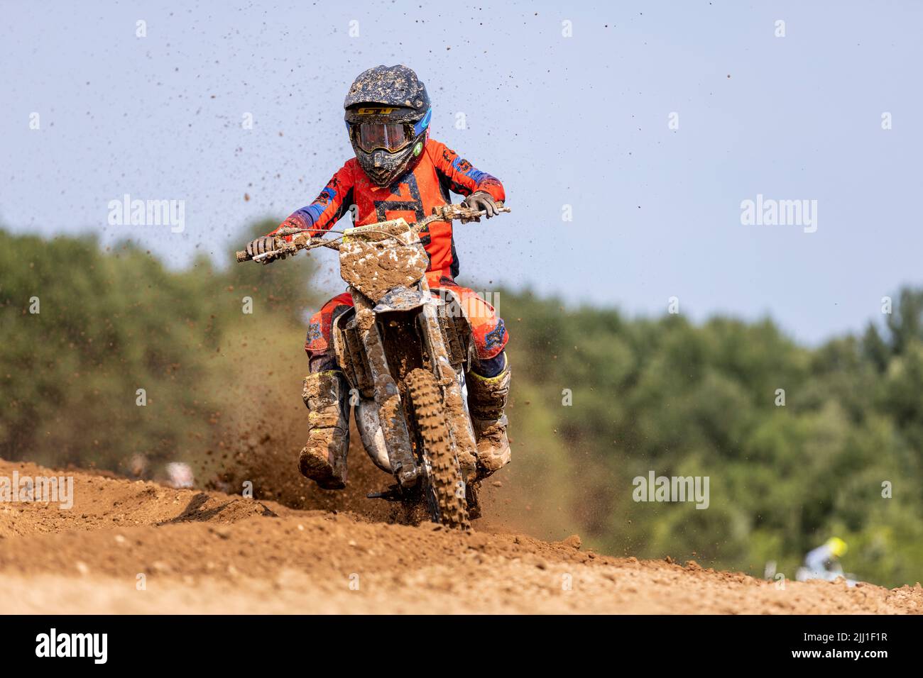 A motocross rider on a track practicing in Fulton, Missouri, USA Stock Photo
