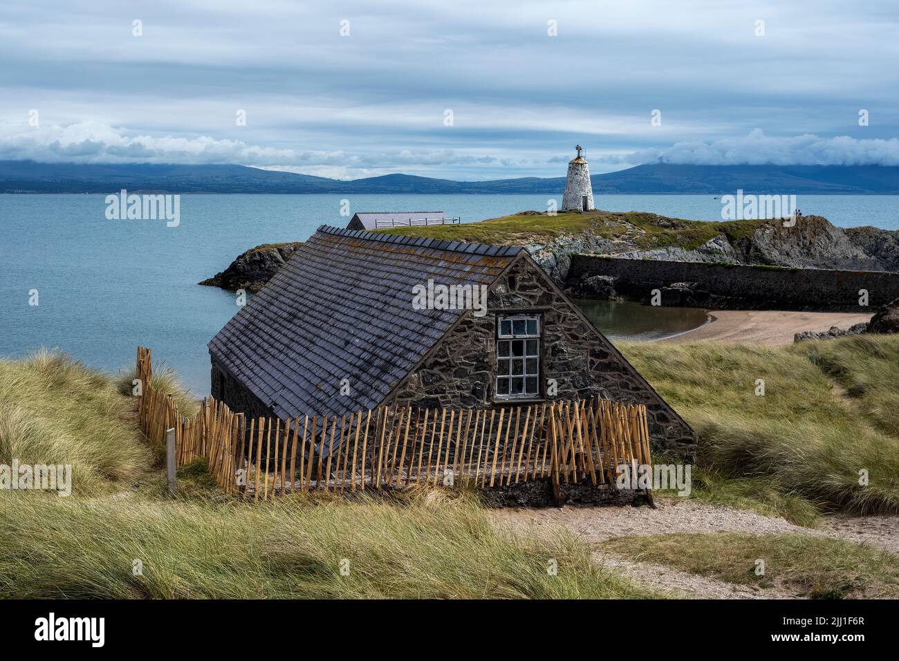 Twr Bach beacon perched on a small island off Ynys Llanddwyn, Anglesey, Wales Stock Photo