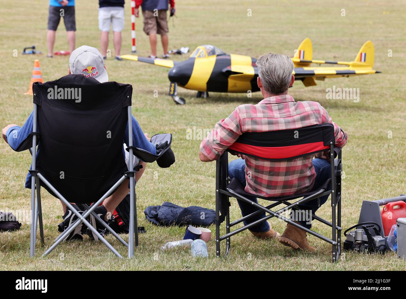 Men seated at the large scale model aircraft show, Cosford, Shropshire.2022 Stock Photo