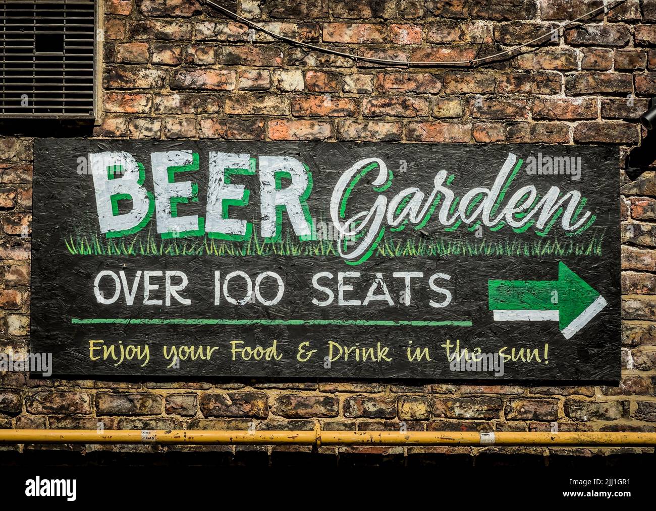 Beer Garden, hand painted sign on pub wall, UK. Stock Photo