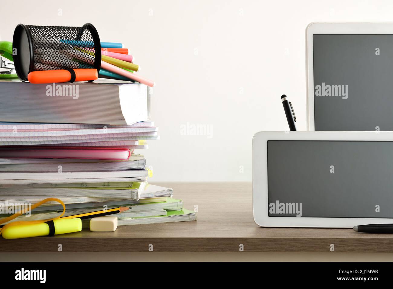 Educational learning comparison between school books and notebooks with