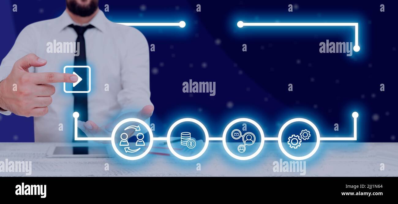 Businessman With A Pad And Pointing On Play Button And Digital Symbols ...