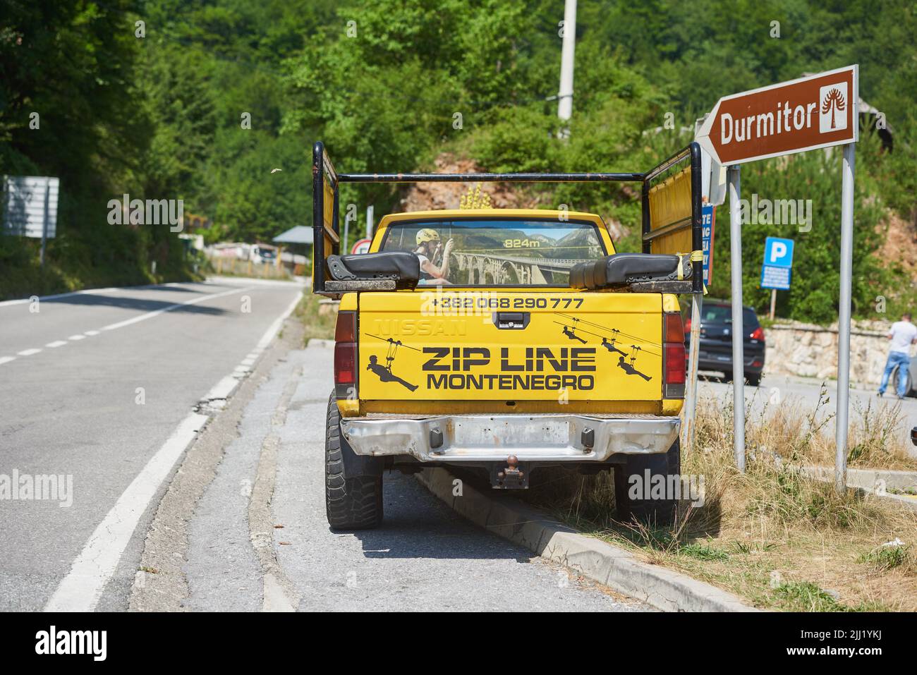 Yellow pickup for transporting tourists to the zip line base Stock Photo