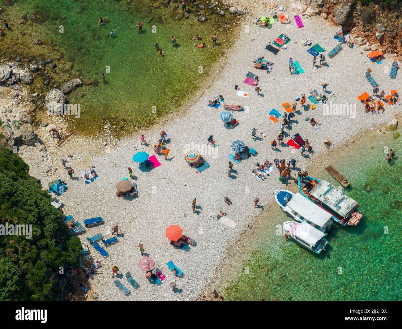 Aerial view of Limni Beach Glyko, on the island of Corfu. Greece. Where the two beaches are connected to the mainland providing a wonderful scenery Stock Photo