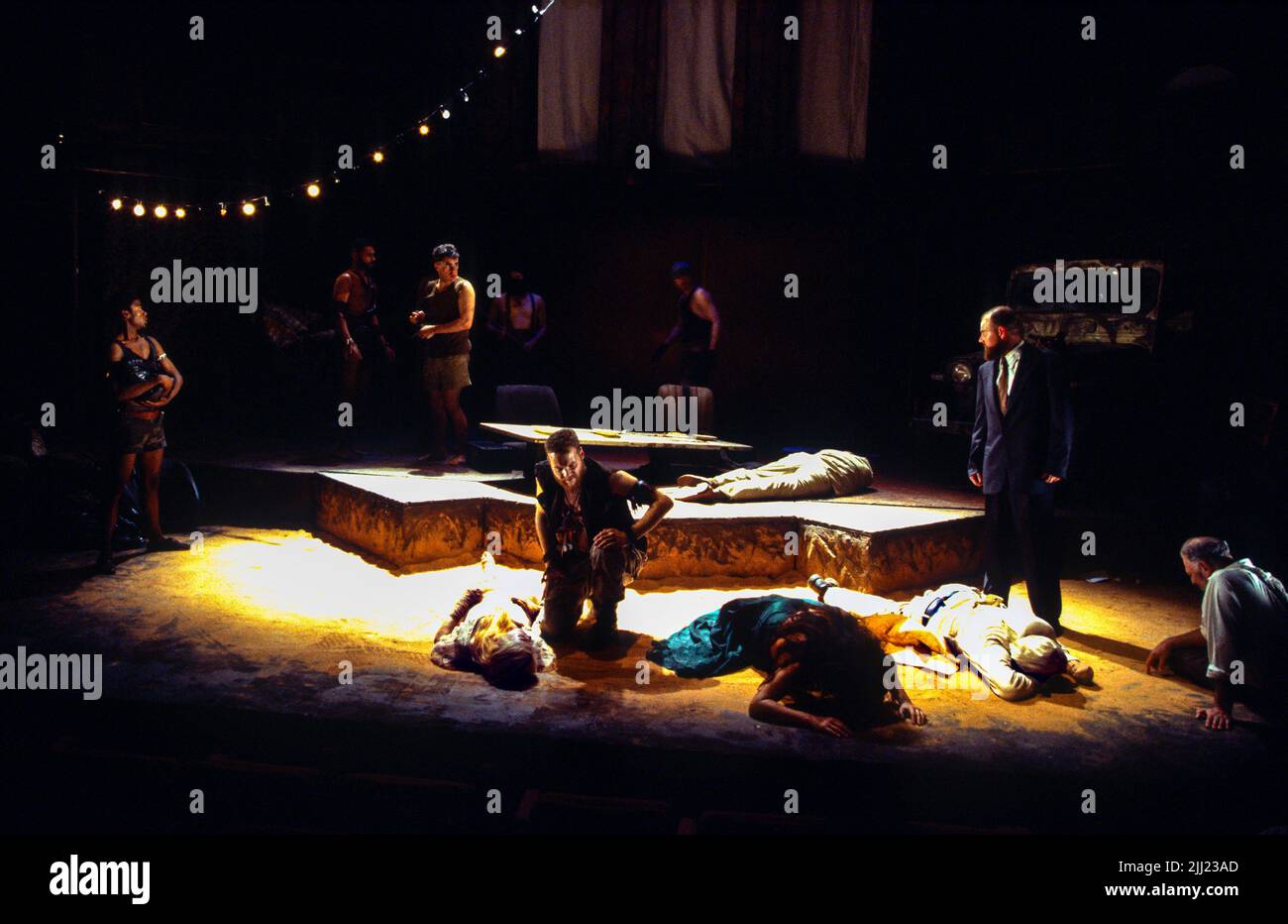 final scene, with the bodies of Lavinia, Tamora and Titus Andronicus in TITUS ANDRONICUS by Shakespeare at the West Yorkshire Playhouse, Leeds, England  12/07/1995  a Market Theatre Johannesburg & Royal National Theatre Studio co-production  set design: Nadya Cohen  costumes: Sue Steele  lighting: Mark Jonathan  fights: Terry King  director: Gregory Doran Stock Photo