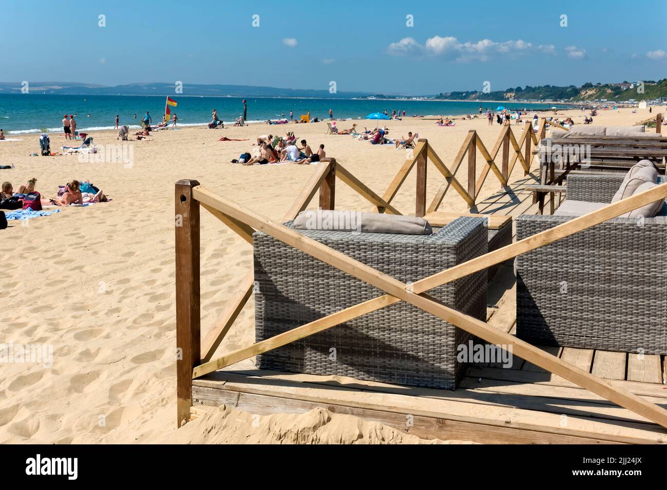 Bournemouth, Dorset, UK - July 11 2018: People relaxing and sunbathing on a hot summers day at Bournemouth Beach in Dorset, England, UK Stock Photo