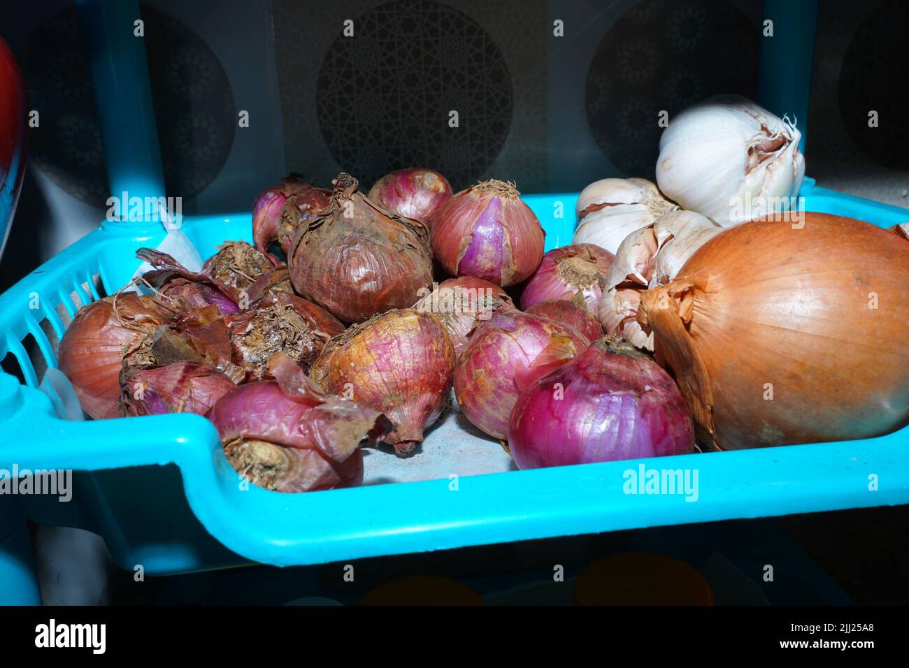 Premium Photo  A sack of garlics shallots and onions