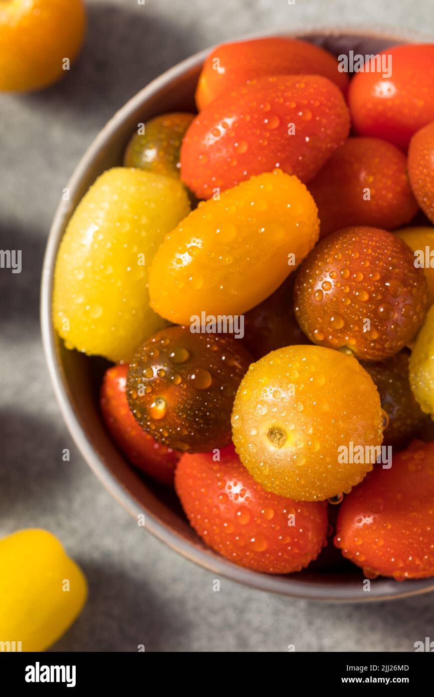 Organic Heirloom Cherry Tomatoes in a Bowl Stock Photo - Alamy