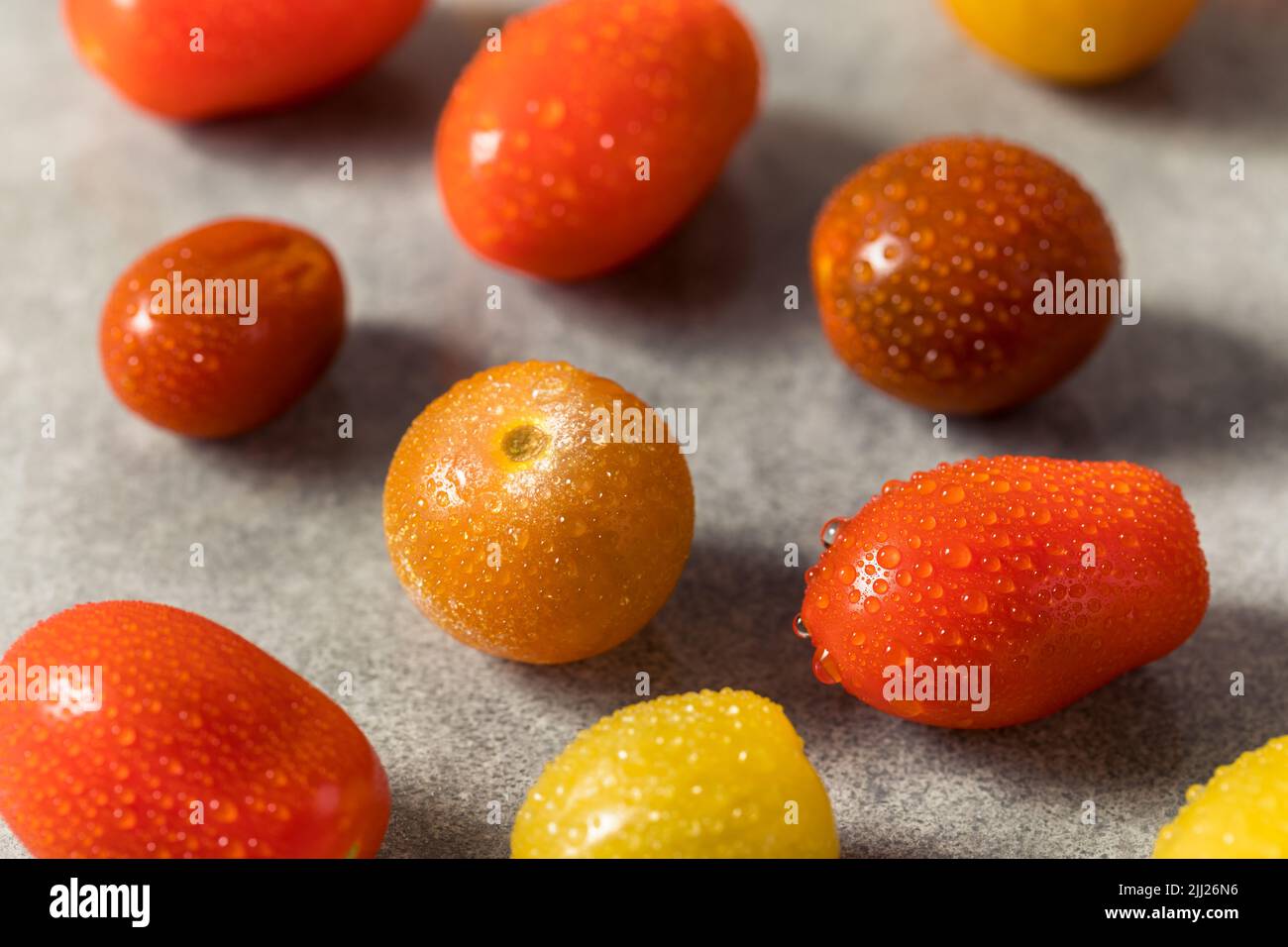 Organic Heirloom Cherry Tomatoes in a Bowl Stock Photo - Alamy